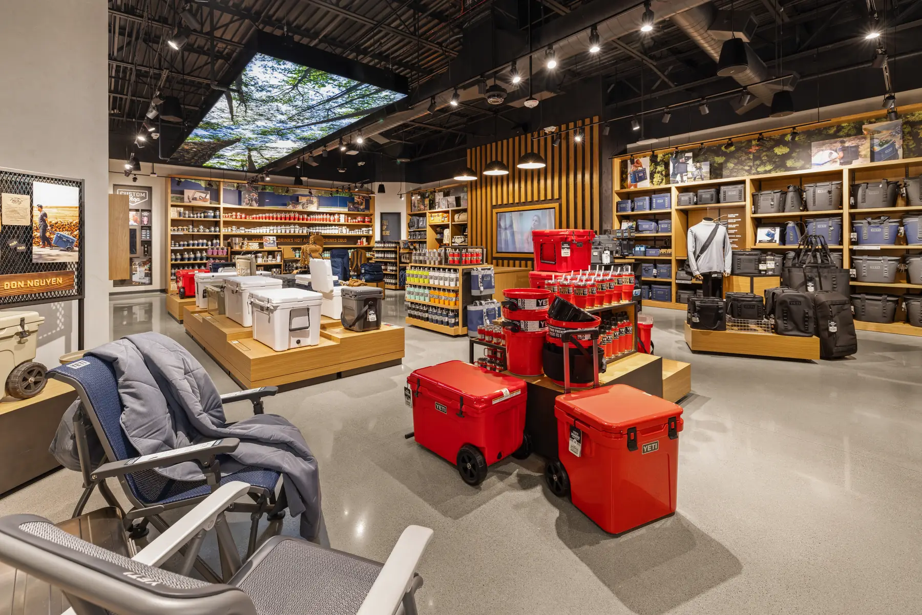 YETI store interior with red coolers and drinkware displays