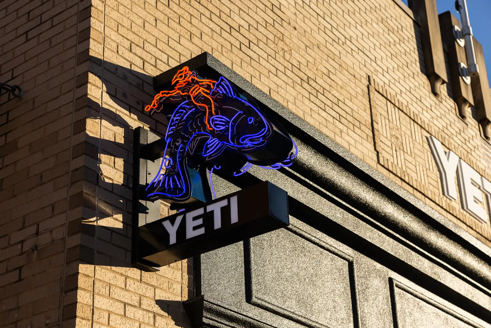 YETI neon blade sign on the store corner